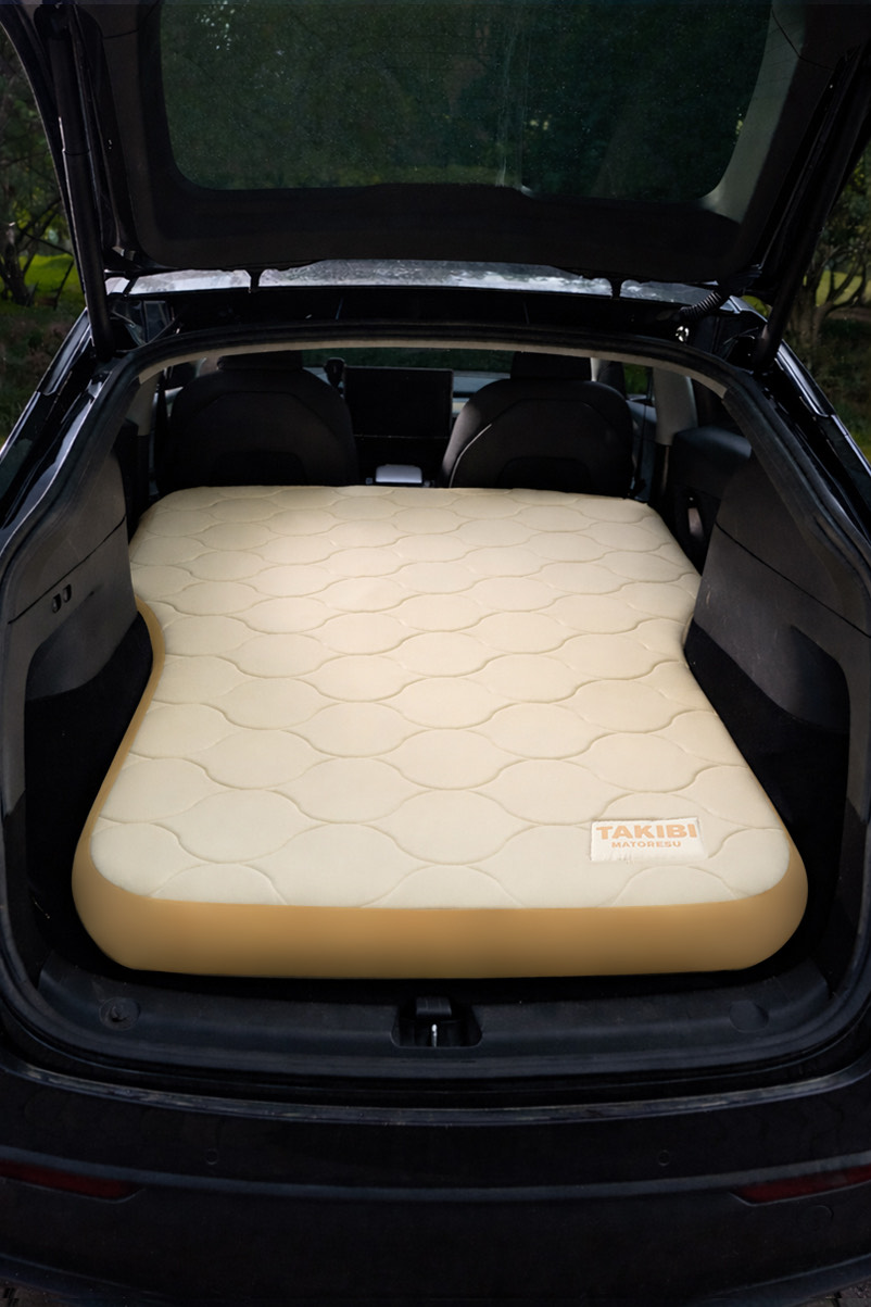 Samtopia TPU inflatable mattress fitted inside Tesla car for camping